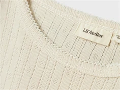 Lil Atelier turtledove top